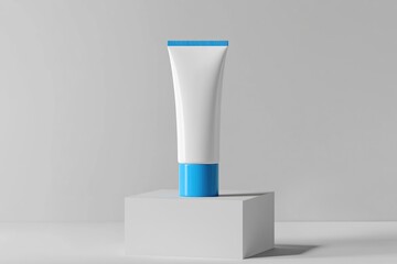 A tube of toothpaste sits atop a decorative pedestal