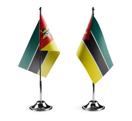Small national flags of the Mozambique on a white background