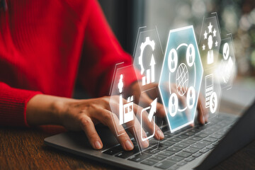 Futuristic digital interface showcasing outsourcing concept with business icons on a laptop, symbolizing global collaboration and efficiency.