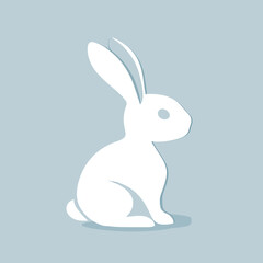 Obraz premium Minimalistic silhouette of a white Easter bunny with large ears and a rounded body on a soft pastel blue background, symbolizing Easter, simplicity, and spring celebrations