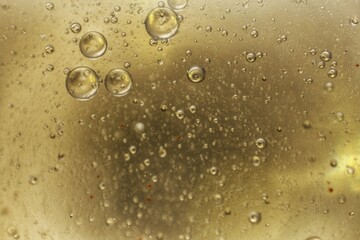 Processed collage of golden yellow oil bubbles texture. Background for banner, backdrop or texture