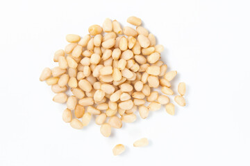 Pile Of Shelled Pine Nuts On A White Background