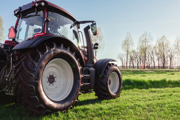 Modern Red Tractor Ready For Work In The Field