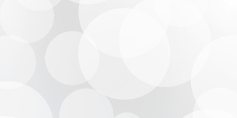 Blurry white sparkling and shiny abstract background. A brilliant blurry white background for a festive mood. Template for greeting card for entertainment.
