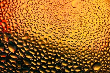 Close-up of water drops on metal surface in high resolution showing condensation of water droplets...