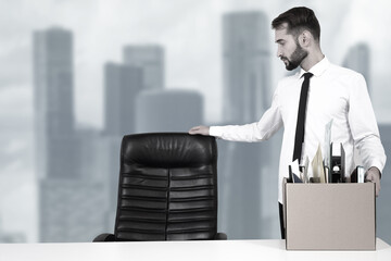 Fired man. Office manager lost job. Upset businessman near workplace after being fired. Dismissal...