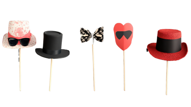 Playful Props: A collection of whimsical props, including hats, a bow tie, and heart-shaped glasses, are arranged on sticks, perfect for adding a touch of fun and creativity to any event.