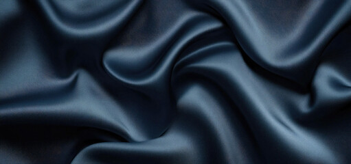 Fototapeta premium Luxurious Deep Blue Satin Fabric Draped Elegantly Soft Smooth Texture Background