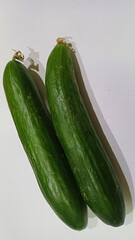 Cucumbers on white background, closeup, food photography