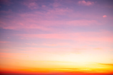 Fototapeta premium Beautiful , luxury soft gradient orange gold clouds and sunlight on the blue sky perfect for the background, take in evening,Twilight, Large size, high definition landscape photo