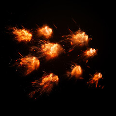 Bursting of pyrotechnics on black background