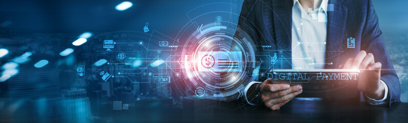 Businessman using a tablet to analyze digital payment trends, online transactions, payment security, transaction history, digital wallets, payment gateways, credit card usage, and payment processing.