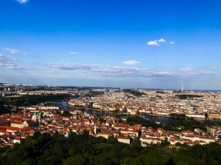 Fototapeta premium Prague scenic summer aerial view on the historical part of the city with the Vltava river and Charles Bridge.