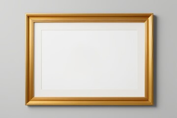 a close up of a gold frame on a gray wall