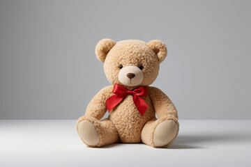 Obraz premium there is a teddy bear with a red bow on it