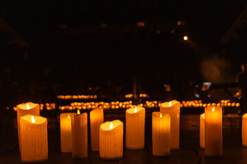 concert stage with lots of candles