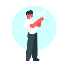 man releases a white dove