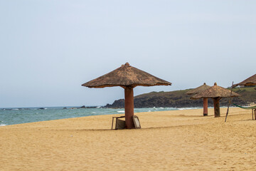 Phu Yen beach is picturesque, with golden sand and a lush green coastline