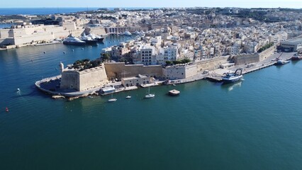 Aerial view of Gardjola gardens - safe heaven gardens, Senglea Point, revealing Fort St. Angelo on...