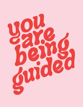 You Are Being Guided" Phrase on Pink Background with Red Typography