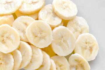Banana slices on a plate. Healthy and dietary food. 