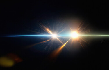 A bright golden light bursts from a dark background.