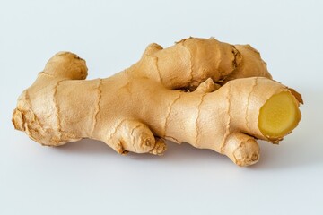 Fototapeta premium Fresh whole ginger root on white background for cooking and medicinal uses