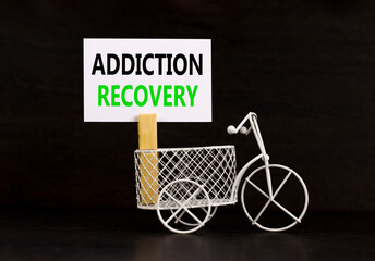 Addiction recovery symbol. Concept words Addiction recovery on beautiful white paper on clothespin....