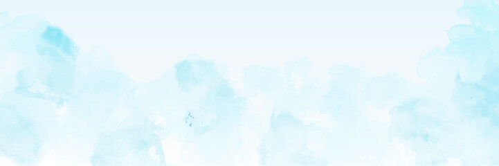 clear blue sky with a few clouds. The sky is very bright and the clouds are scattered throughout