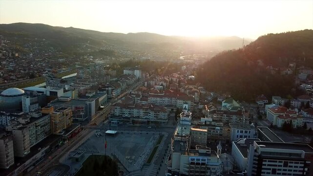 View of Ramnicu Valcea, Romania, during golden hour showinv the nature beauty of the country
