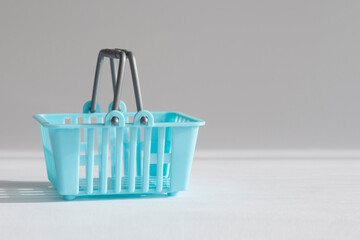 Blue shopping basket for shopping in the supermarket.