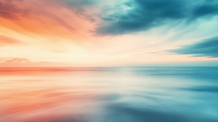 Fototapeta premium Tranquil ocean sunset with vibrant sky and smooth waves