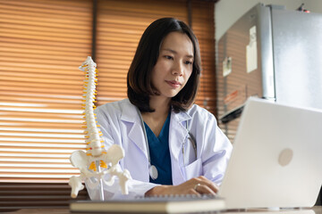 close up special chiropractor woman check about OPD of patient or medical article with spine...