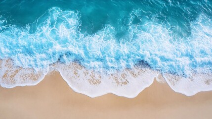 Obraz premium stunning sandy beach with soft blue ocean waves gently splashing along the coastline