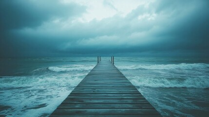 Obraz premium Wooden pier extending into stormy sea