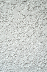 White rough plaster on wall closeup