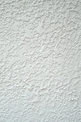 White rough plaster on wall closeup