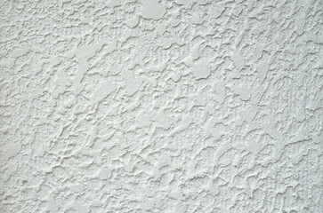 White rough plaster on wall closeup