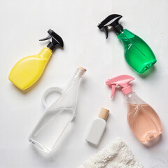 Aesthetic arrangement of cleaning sprays on minimal background, cleanliness