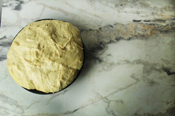 dough in a plate from the top place for copyspace text