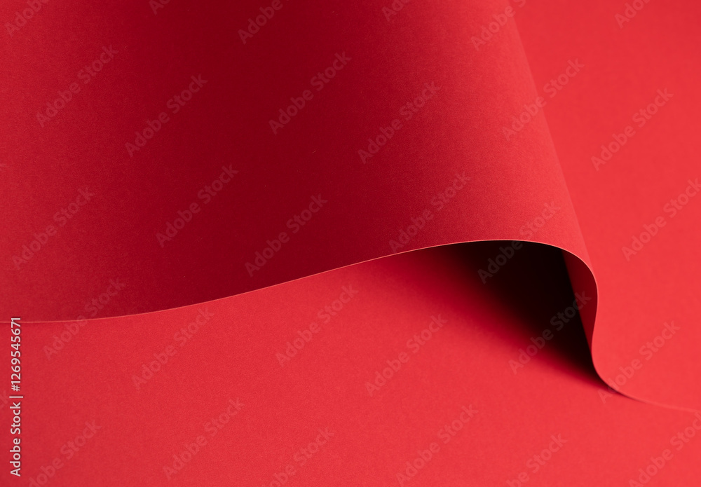 Poster Bold scarlet red paper background with a deep matte texture and overlapping folds. Vibrant crimson and cherry tones create an elegant, minimal, and abstract composition with clean geometric lines and