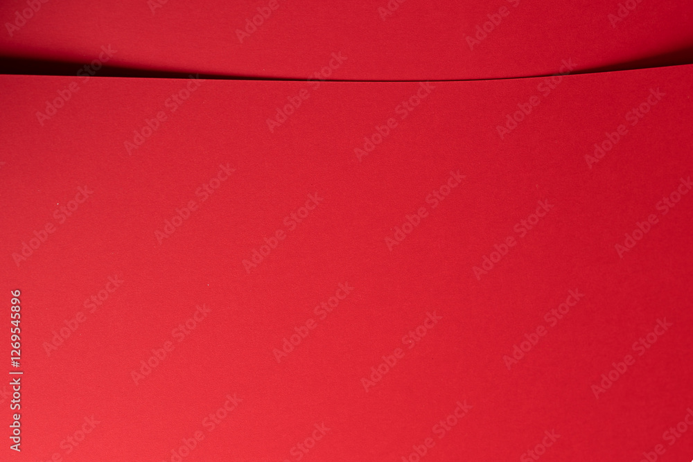 Aufkleber Bold scarlet red paper background with a deep matte texture and overlapping folds. Vibrant crimson and cherry tones create an elegant, minimal, and abstract composition with clean geometric lines and