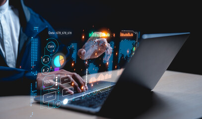 A professional using a laptop with digital graphs and data visualizations, symbolizing analytics and technology in a modern workspace.
