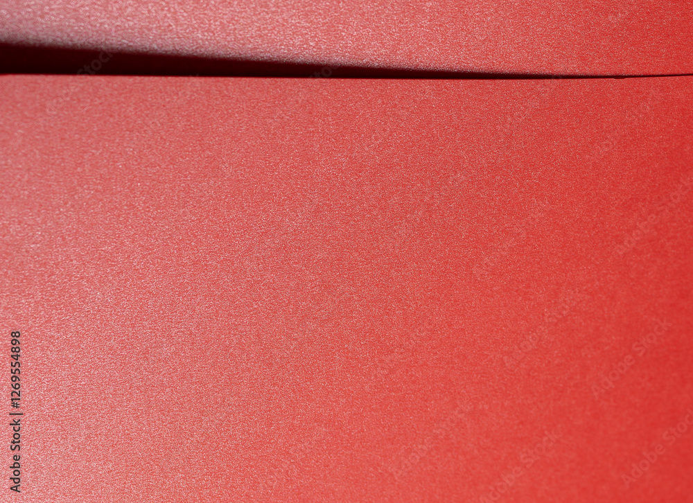 Poster Fiery crimson paper background with a fine grainy texture and layered folds. Rich ruby and scarlet tones create a bold, elegant, and luxurious abstract design with dynamic contrast.