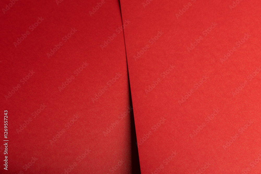 Aufkleber Fiery crimson paper background with deep ruby tones and bold diagonal folds. Layered geometric lines and a smooth gradient