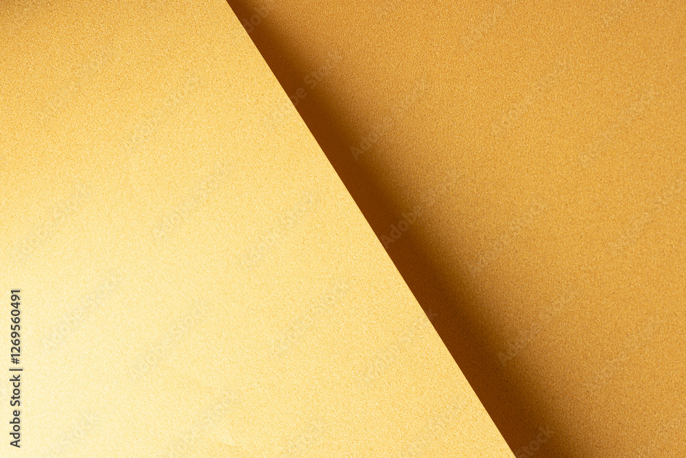 Aufkleber Golden saffron paper background with a pearlescent, glossy texture and shimmering reflections. Radiant honey tones and sleek geometric folds create a rich, elegant, and luxurious abstract design.