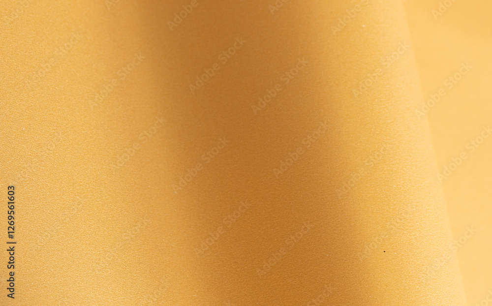Aufkleber Golden yellow paper background with a smooth texture and soft gradient. Subtle waves and refined shadows create an elegant, sophisticated, and harmonious abstract composition.