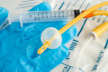 Foley catheter and urine drainage bag collect urine for disability or patient in hospital.