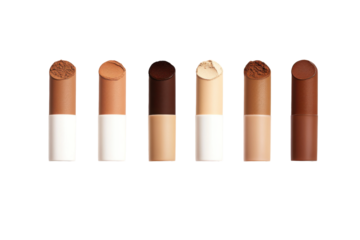 Collection of contouring sticks in various shades for different skin tones on white background