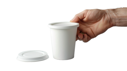 hand holding a cup of coffee